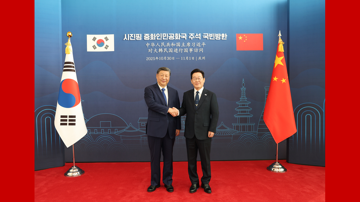 习近平同韩国总统李在明会谈